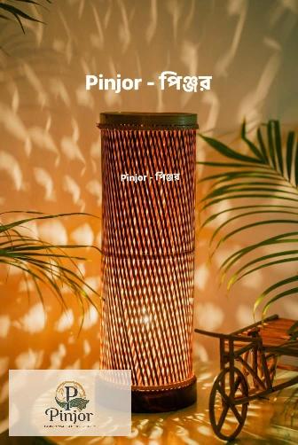 Handcrafted cylinder bamboo tubo lamp with warm illumination for sustainable home decor