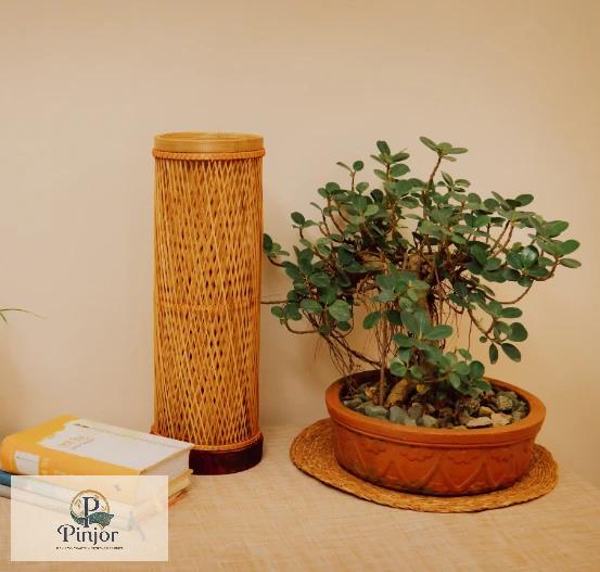 Handcrafted cylinder bamboo tubo lamp with warm illumination for sustainable home decor