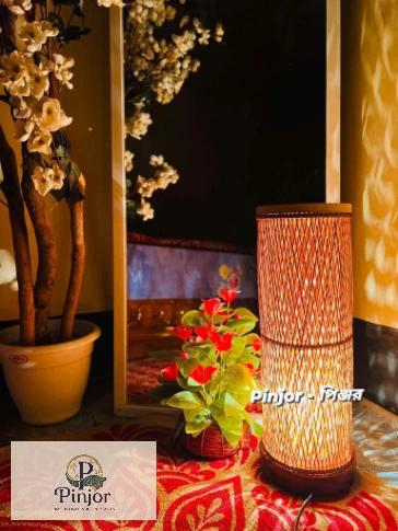 Handcrafted cylinder bamboo tubo lamp with warm illumination for sustainable home decor
