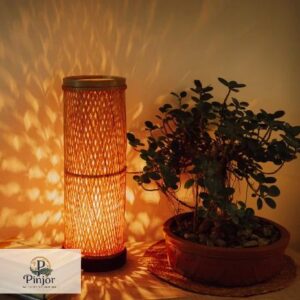 Handcrafted cylinder bamboo tubo lamp with warm illumination for sustainable home decor