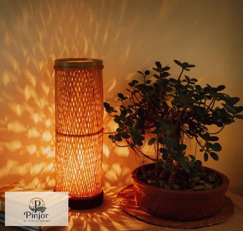 Handcrafted cylinder bamboo tubo lamp with warm illumination for sustainable home decor